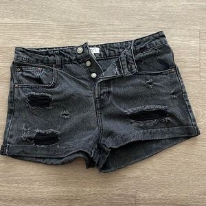 Forever 21 black distressed jean shorts. Size 28.